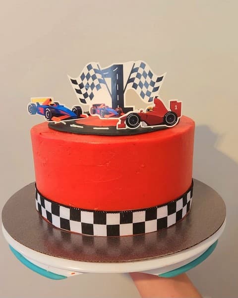 Race care cake in red and checkered stripes below